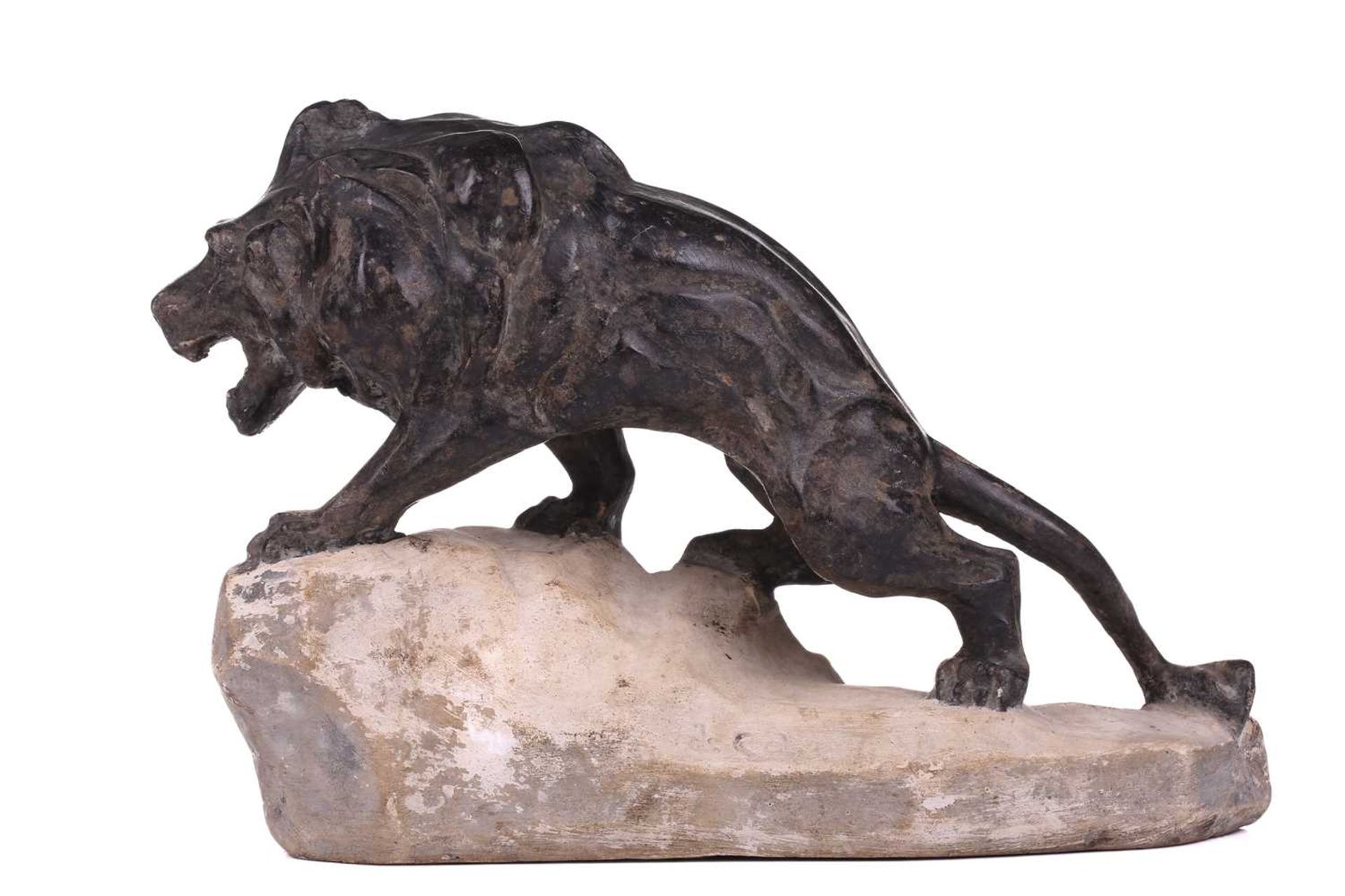 J. Colombini, a patinated composite sculpture of a lion on a rock outcrop, incised signature with - Image 2 of 7