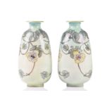 Agnes Baigent (active 1901-1910) for Doulton Lambeth; a pair of Art Nouveau faience vases of