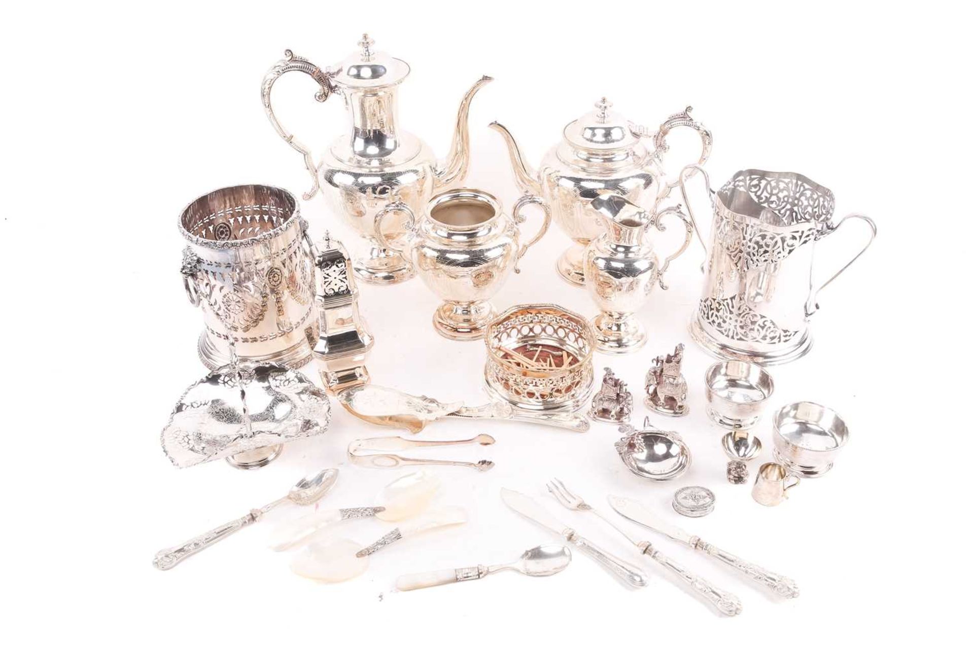 A four-piece silver plated tea and coffee set with bone insulators, together with other items of