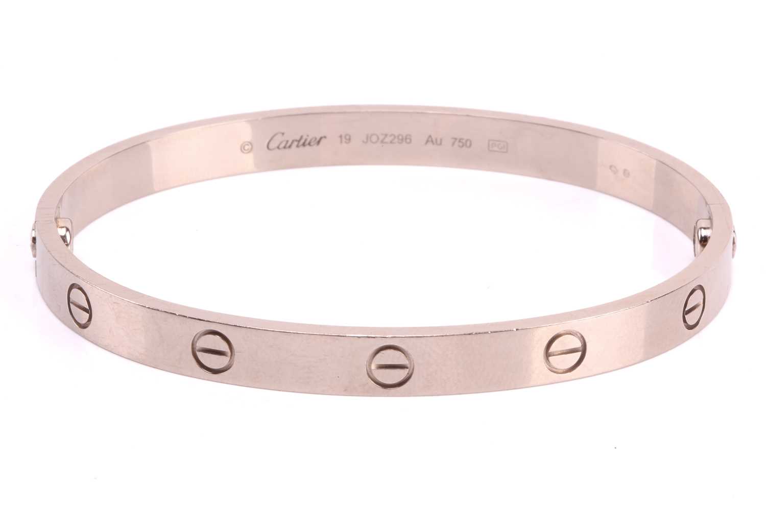 Cartier - a 'LOVE' bangle in 18ct white gold, composed of two rigid arcs with screw motifs, - Image 4 of 17