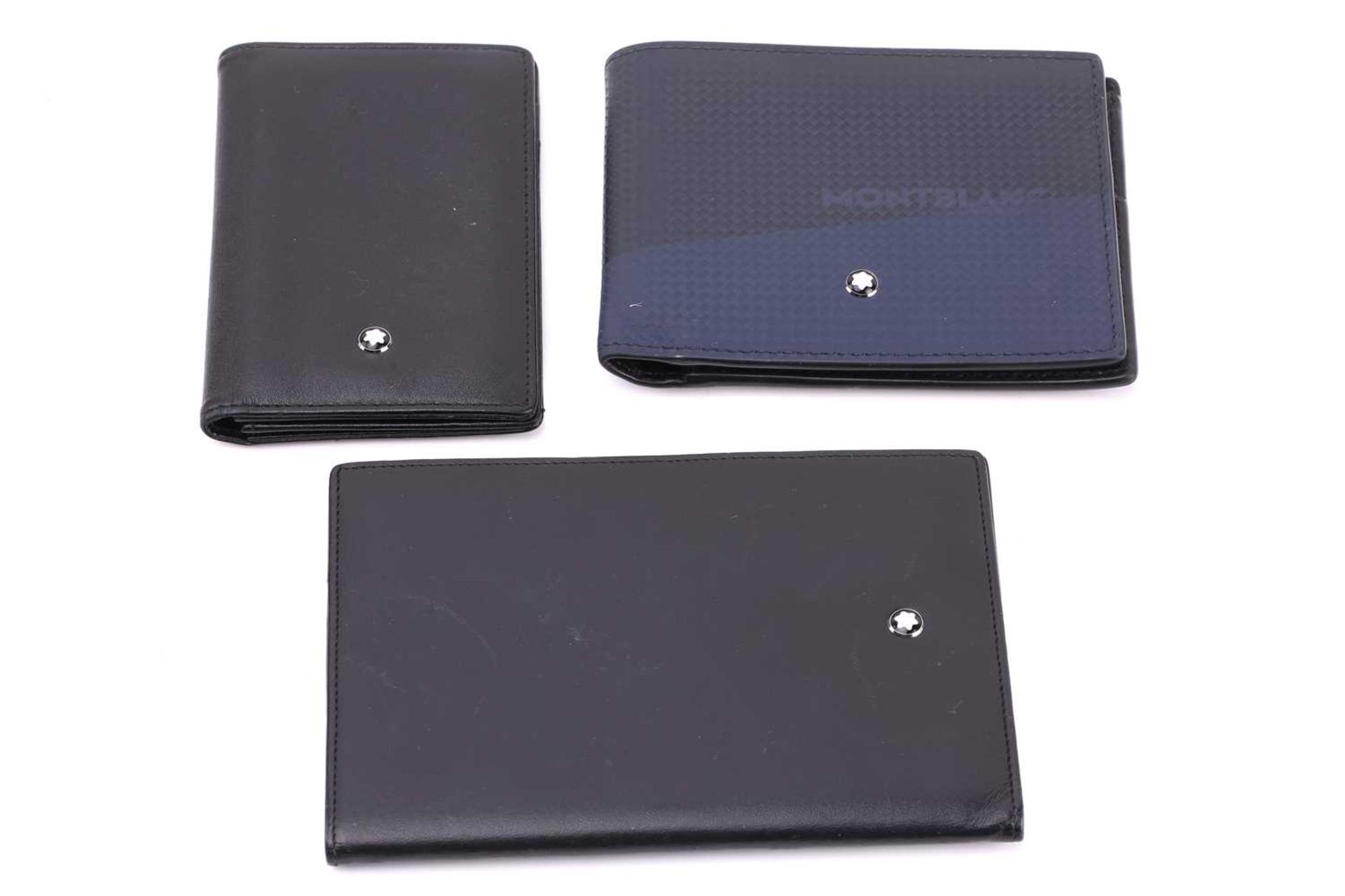 Montblanc - three small leather goods; including an Extreme 2.0 wallet in blue, a Meisterstück