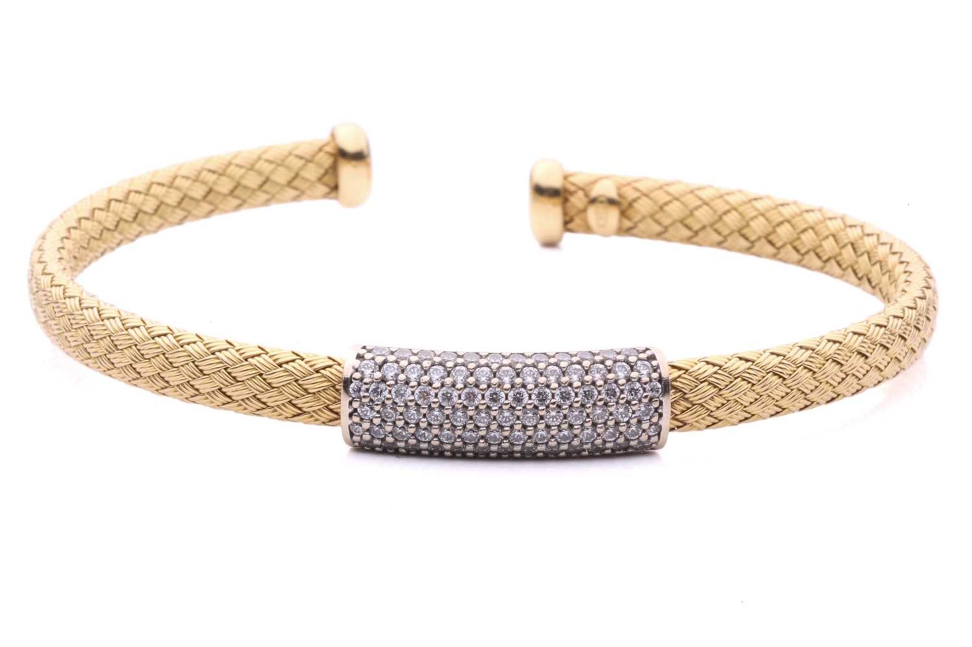 A wire mesh bangle featuring a central panel pavé set with colourless stones, in yellow metal