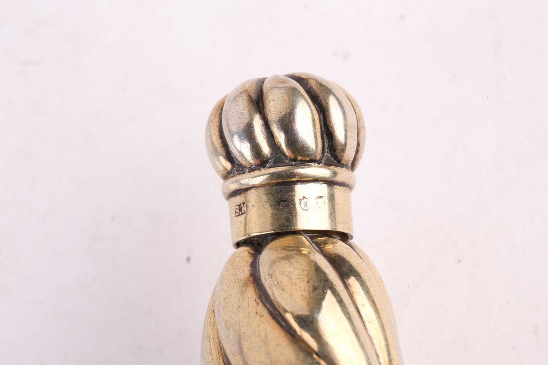 A collection of silver scent bottles, including a large conical with spiral reeded decoration and - Image 9 of 16