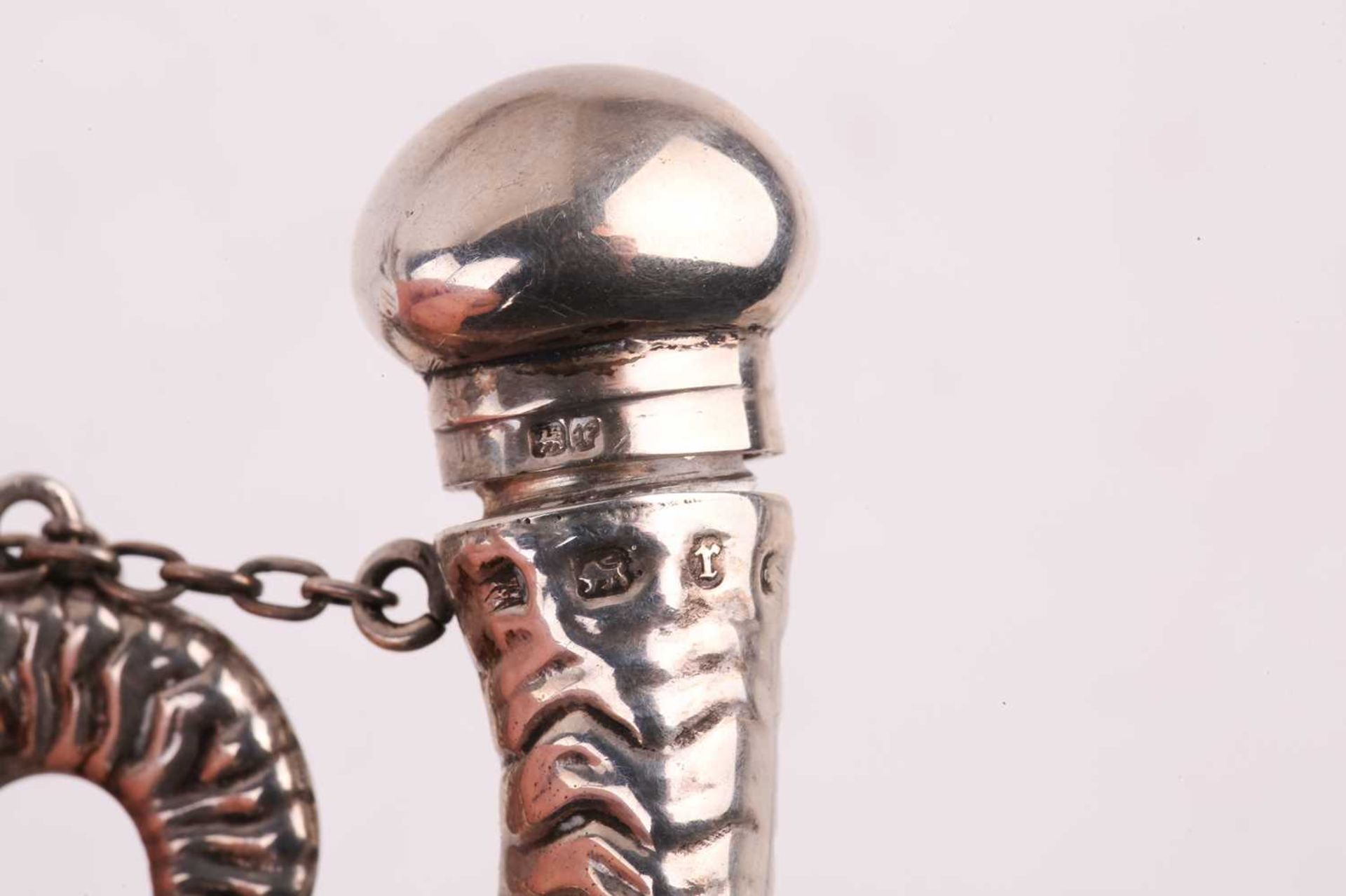 A collection of silver scent bottles, including a large conical with spiral reeded decoration and - Image 13 of 16