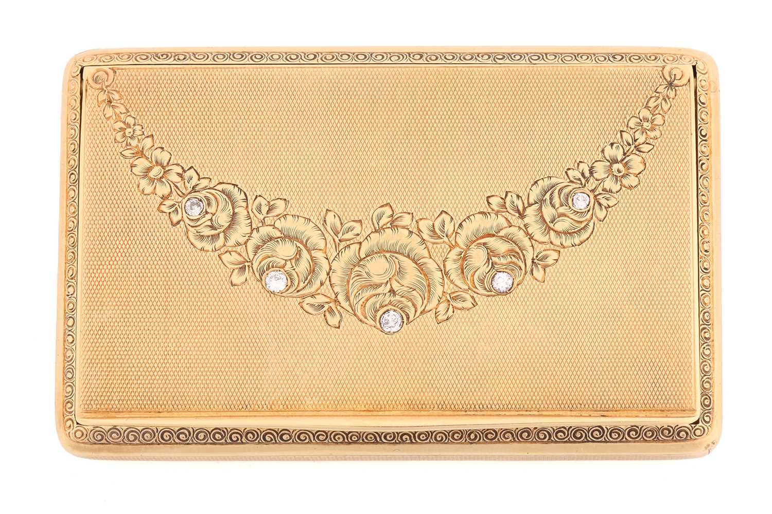 A floral snuffbox set with diamonds, of rectangular form with rounded corners, the cover, sides