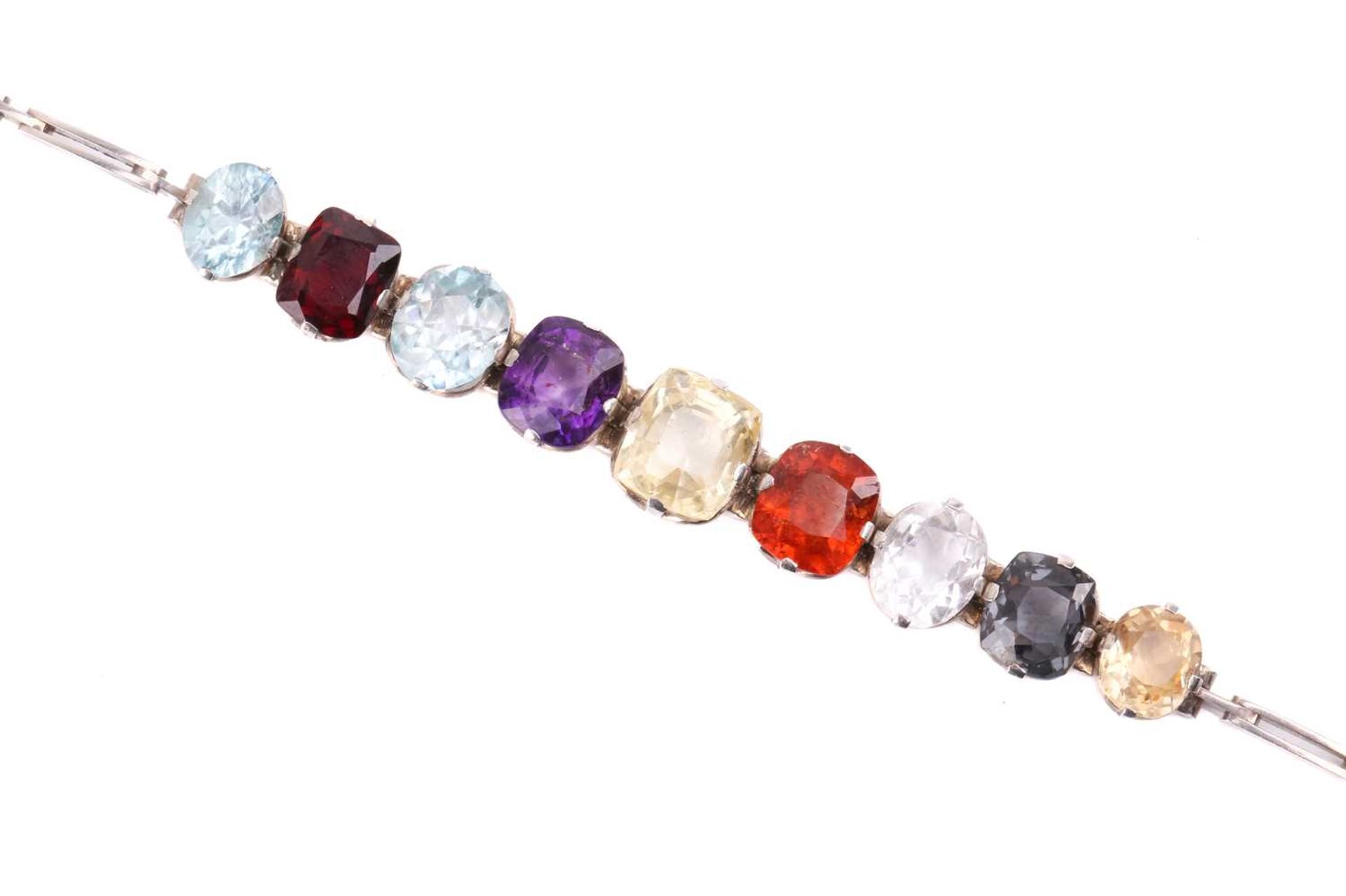 An Edwardian multi-gem Harlequin bracelet, set with a zircon 7.5 x 6.0 mm, garnet 8.0 x 6.5 mm, - Image 2 of 5