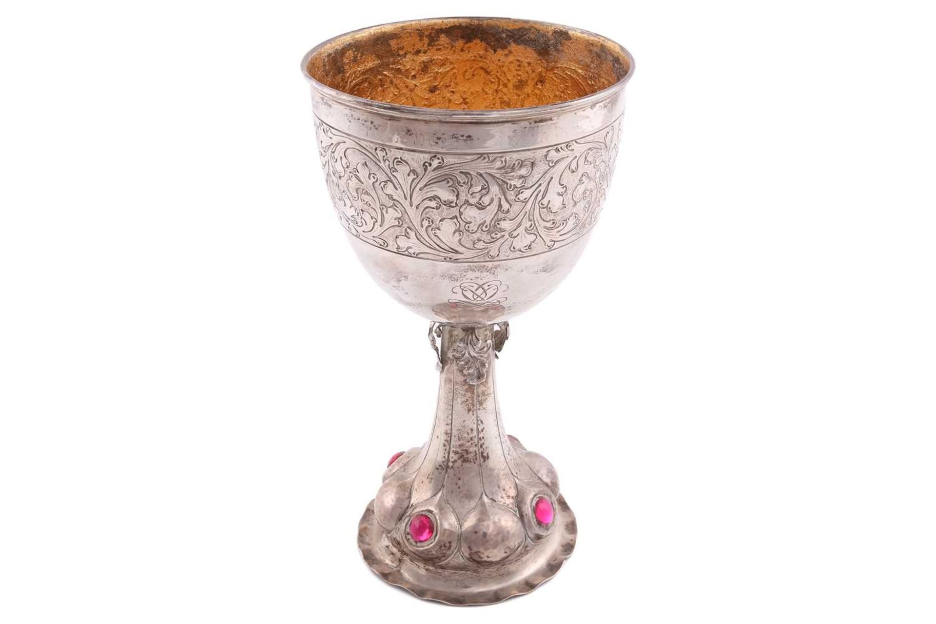 A continental chalice with a gilt interior, the exterior of the bowl with rubbed-off inscription '