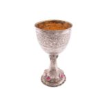 A continental chalice with a gilt interior, the exterior of the bowl with rubbed-off inscription '