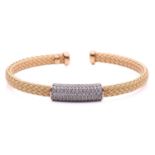 A wire mesh bangle featuring a central panel pavé set with colourless stones, in yellow metal