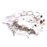 A collection of white metal jewellery including an amber pendant, a feather pendant marked 925,
