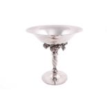 Georg Jensen - a tazza designed with spot-hammered circular flared bowl standing atop twisted