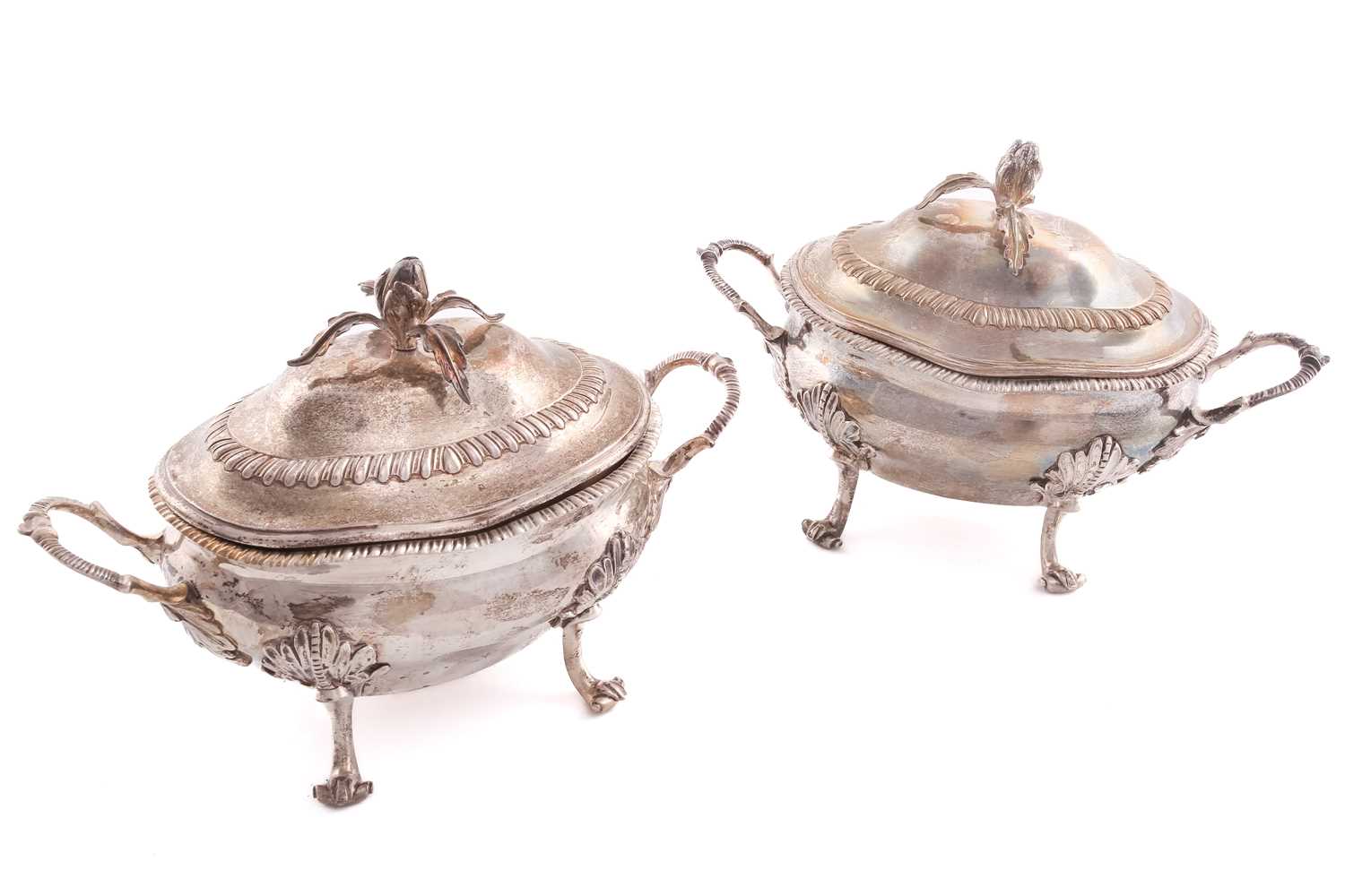 A pair of George III silver sauce tureens and covers, London 1771 by Robert Peaston, twin handled