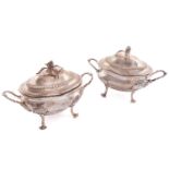 A pair of George III silver sauce tureens and covers, London 1771 by Robert Peaston, twin handled