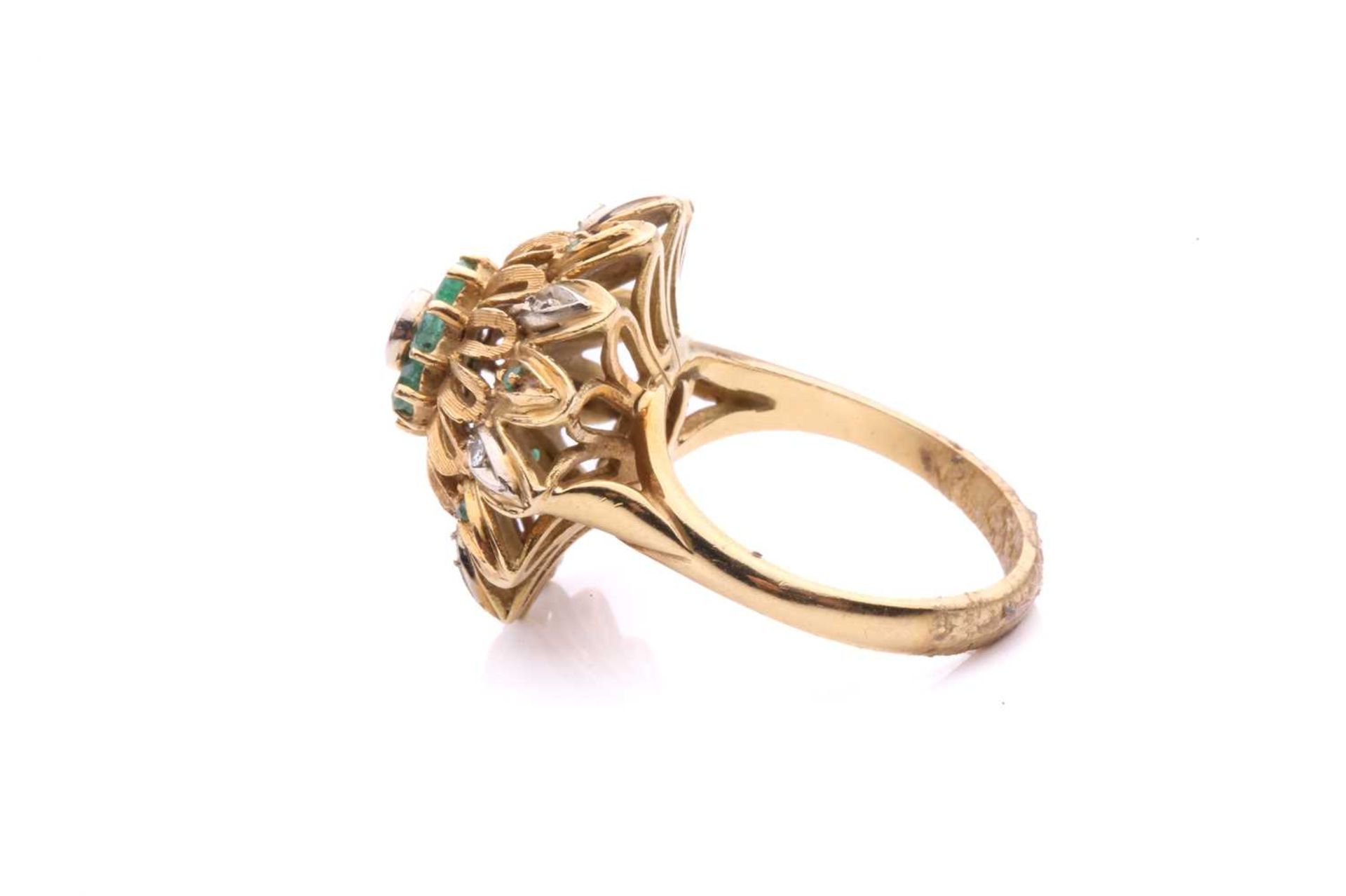 An emerald and diamond flowerhead dress ring, of bombé design, centred with a cluster of a single- - Image 5 of 5