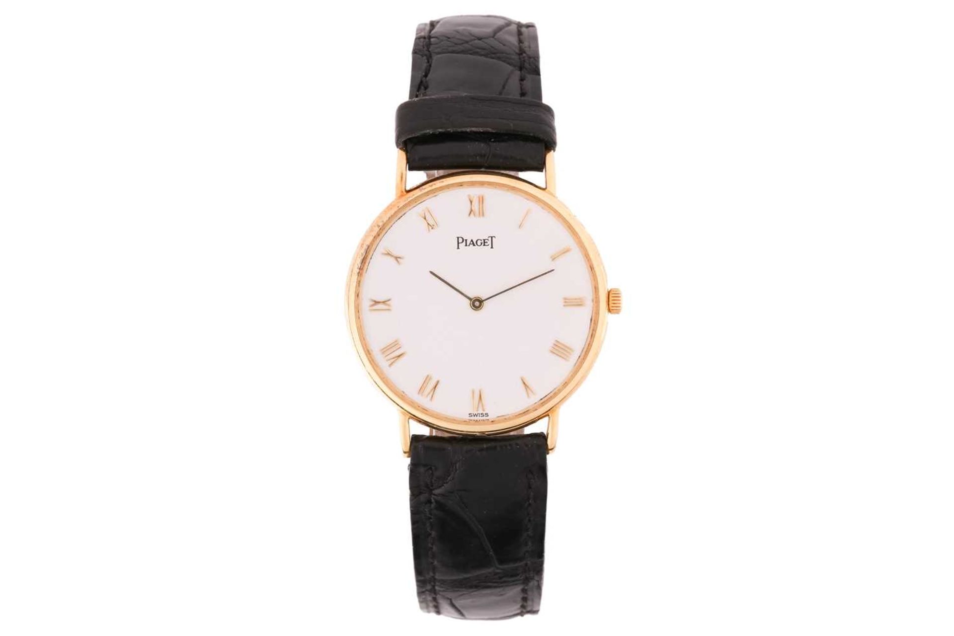 A Piaget 18ct gold Lady's wristwatch, with quartz movement, the white dial with gilt roman roman