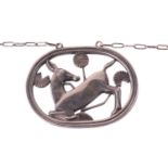 Georg Jensen - a necklace with kneeling fawn and flowers, attached to a cable chain and toggle