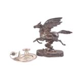 A Continental (believed Italian) white metal table centre, modelled as a winged horse, possibly a