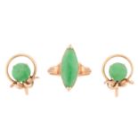 A pair of jade earrings and a dress ring; the earrings each containing a bright green round jade