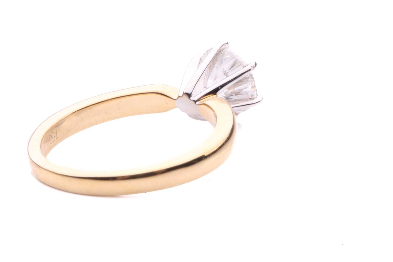 A diamond solitaire ring in 18ct gold, centred with a brilliant-cut diamond of 6.7 mm with an - Image 4 of 5