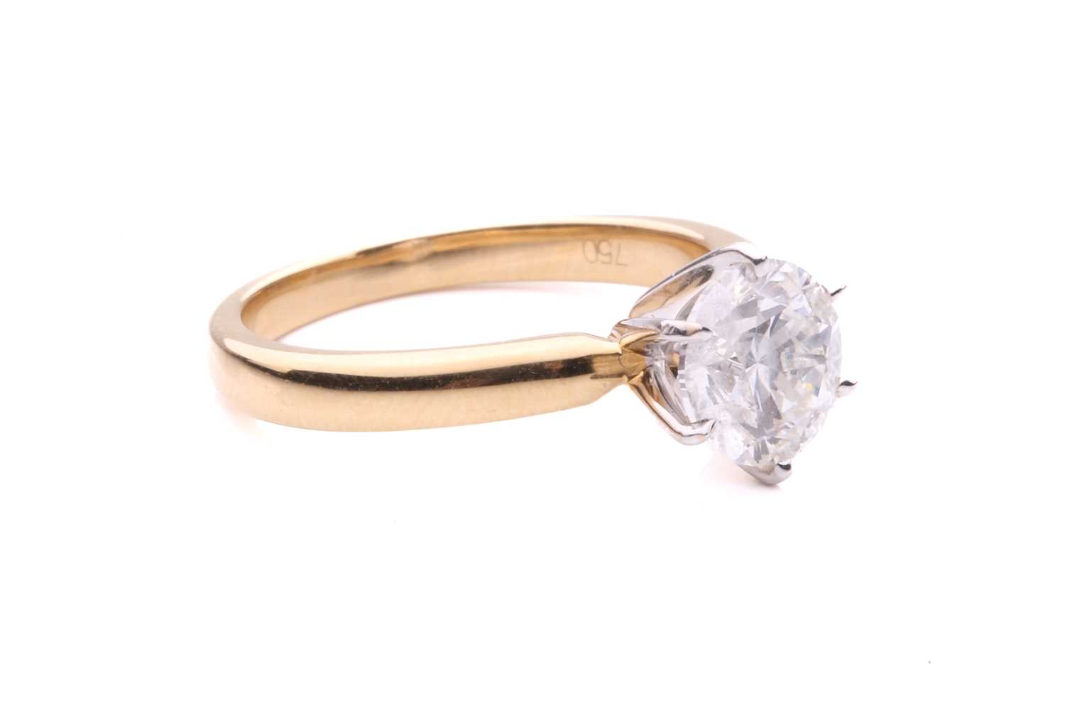 A diamond solitaire ring in 18ct gold, centred with a brilliant-cut diamond of 6.7 mm with an - Image 3 of 5