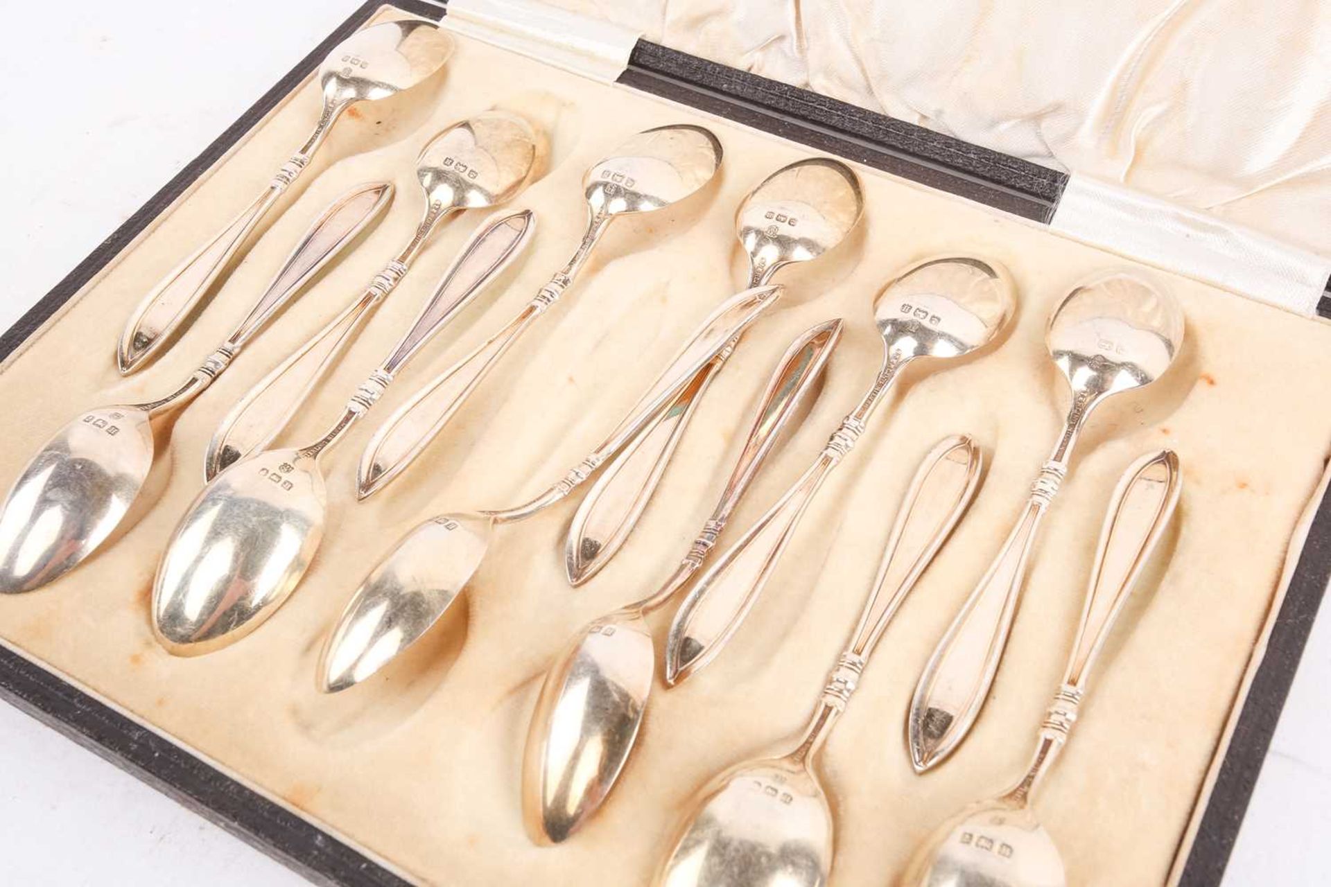 A cased set of twelve "Sterling" gilded and enamel coffee spoons each with contrasting coloured - Bild 8 aus 8