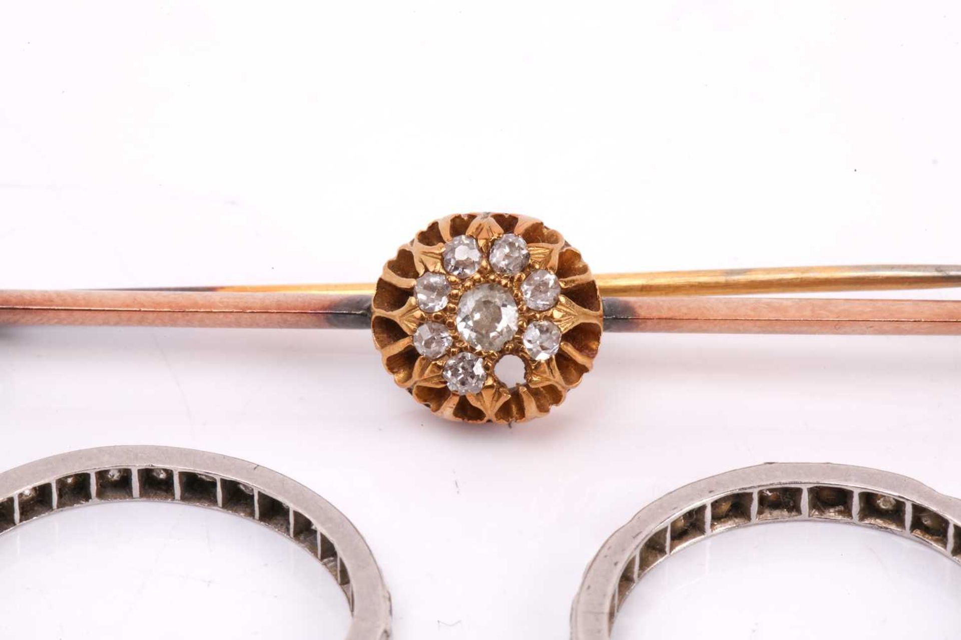 A diamond cluster bar brooch together with two diamond eternity rings. The brooch set with a cluster - Image 3 of 6