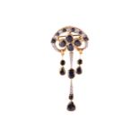 A sapphire and diamond chandelier pendant brooch, centred with a cluster of four oval-cut