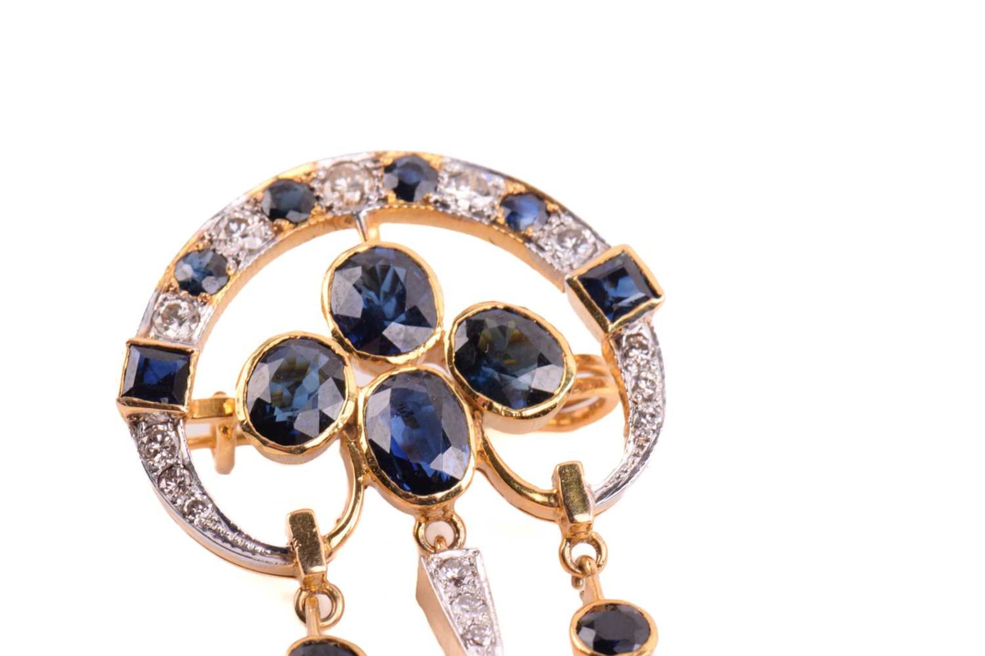 A sapphire and diamond chandelier pendant brooch, centred with a cluster of four oval-cut - Image 4 of 4