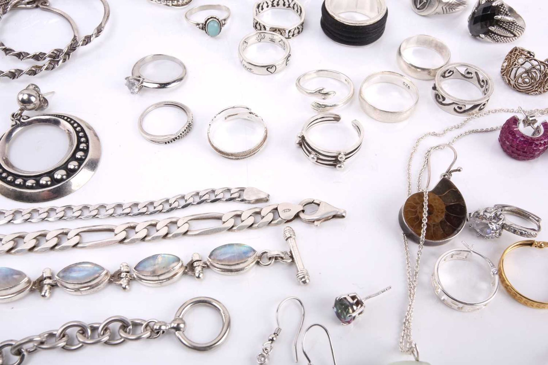 A collection of mixed white metal jewellery, including examples of a silver hinged bracelet, half of - Image 3 of 10