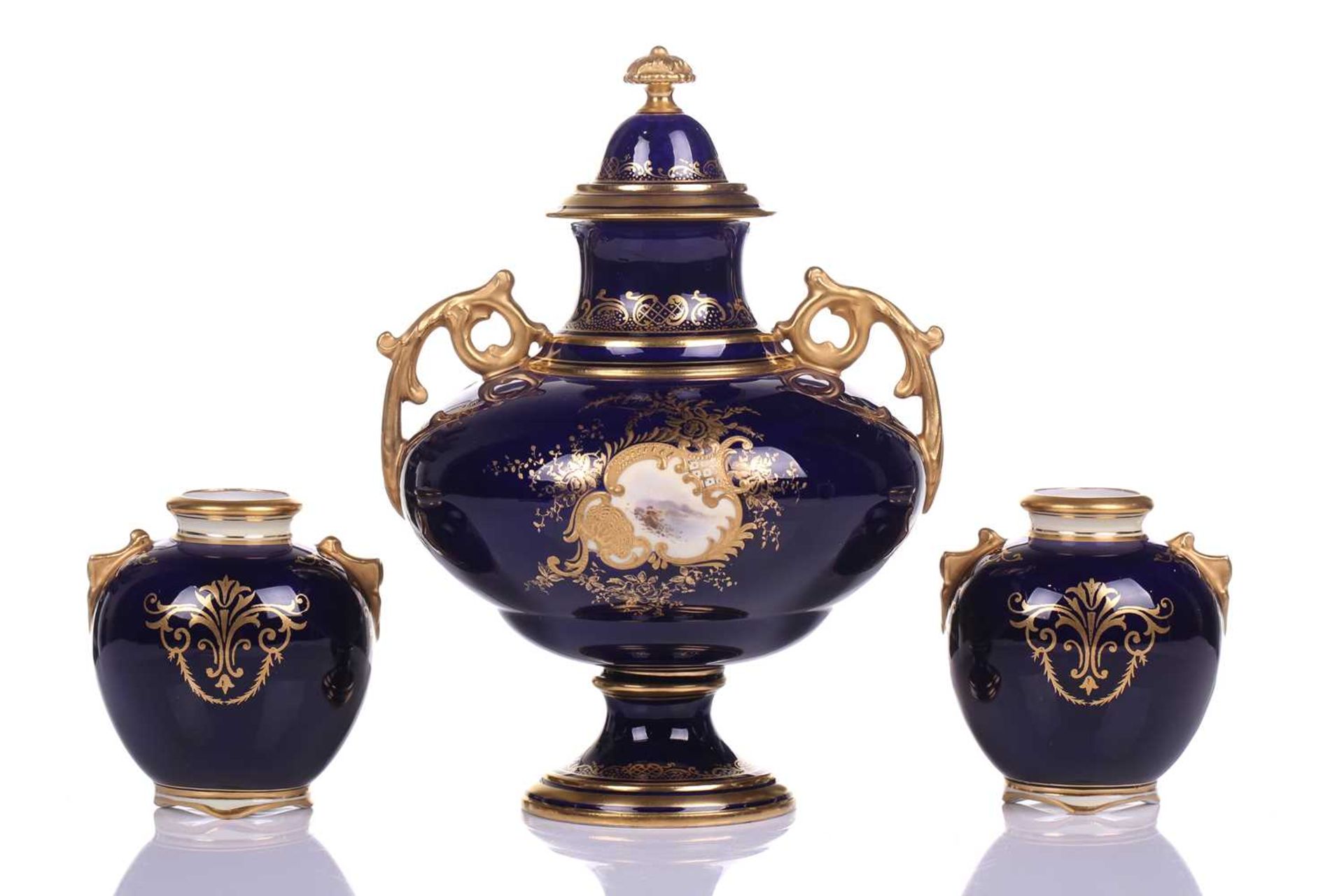 A Coalport Bleu de Roi porcelain two-handled globular urn and cover hand painted with romantic - Image 8 of 12