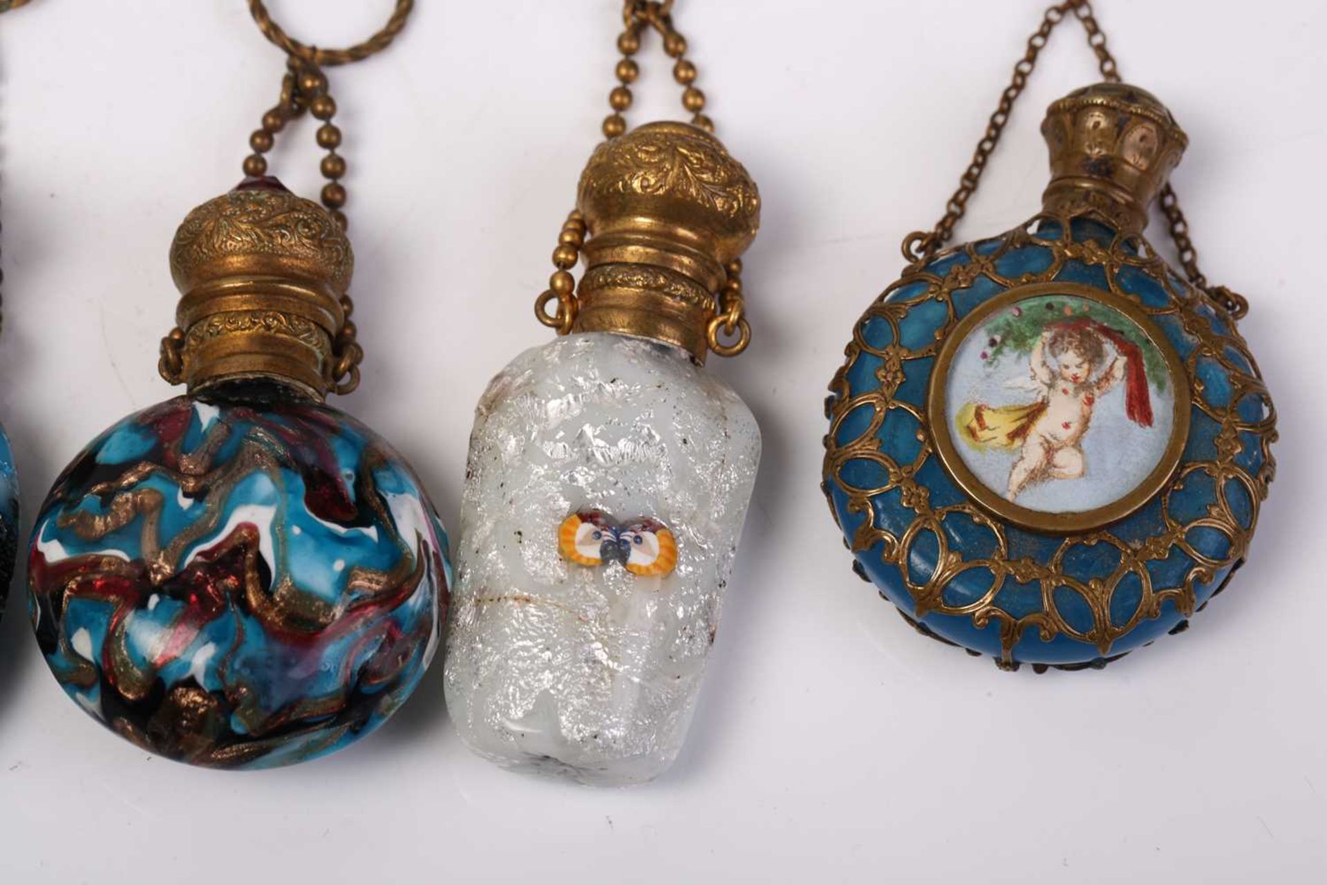A good collection of miniature Continental ceramic and Murano glass scent bottles, many with gilt - Image 3 of 19