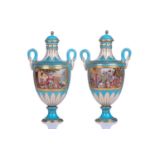 A pair of small Sevres Bleu Celeste two-handled vases and covers,19th century, each painted with