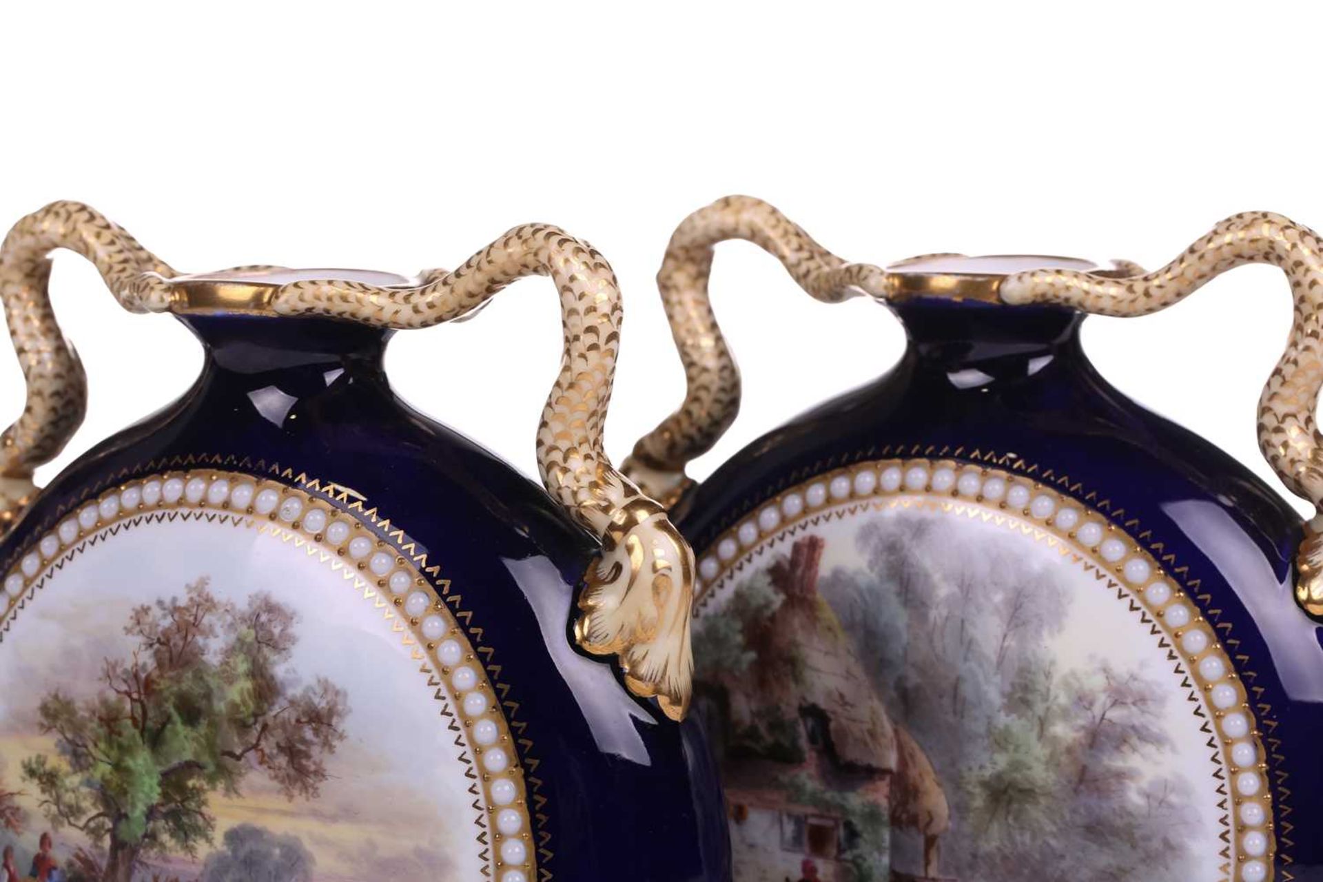 A pair of Grainger and Co Worcester Bleu de Roi pilgrim flask vases, shape number 1015, painted with - Image 6 of 7