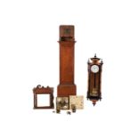 An Austrian late 19th-century single-weight wall Vienna regulator timepiece with walnut and ebonized