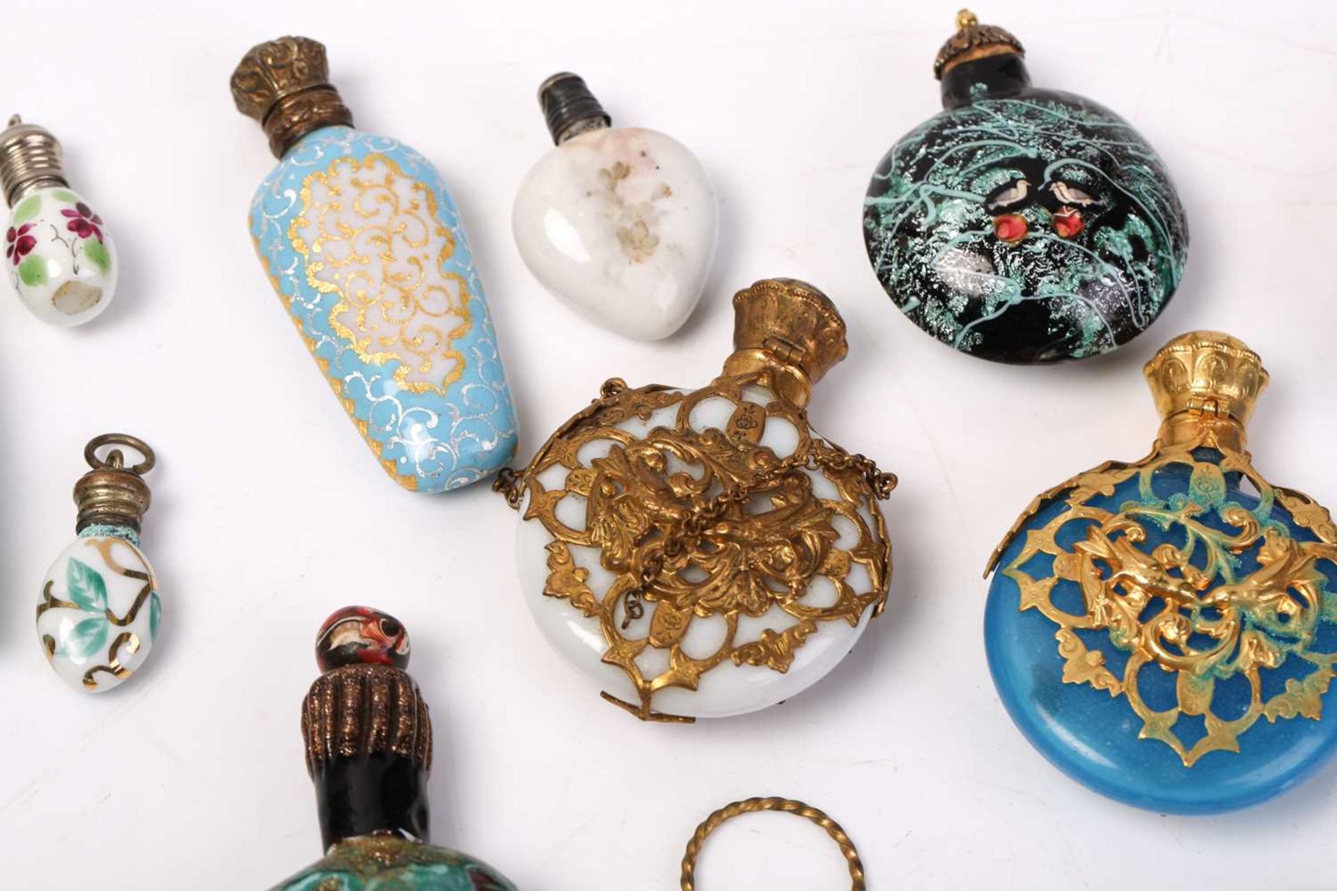 A good collection of miniature Continental ceramic and Murano glass scent bottles, many with gilt - Image 12 of 19