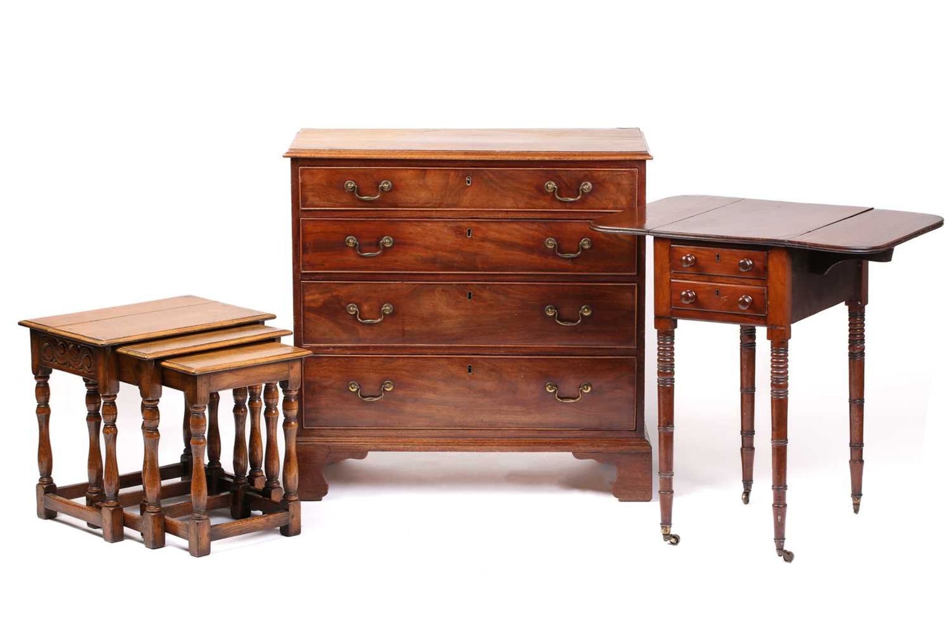 An early 19th-century mahogany and deal chest of four long drawers, 83 cm wide x 46 cm deep x 83