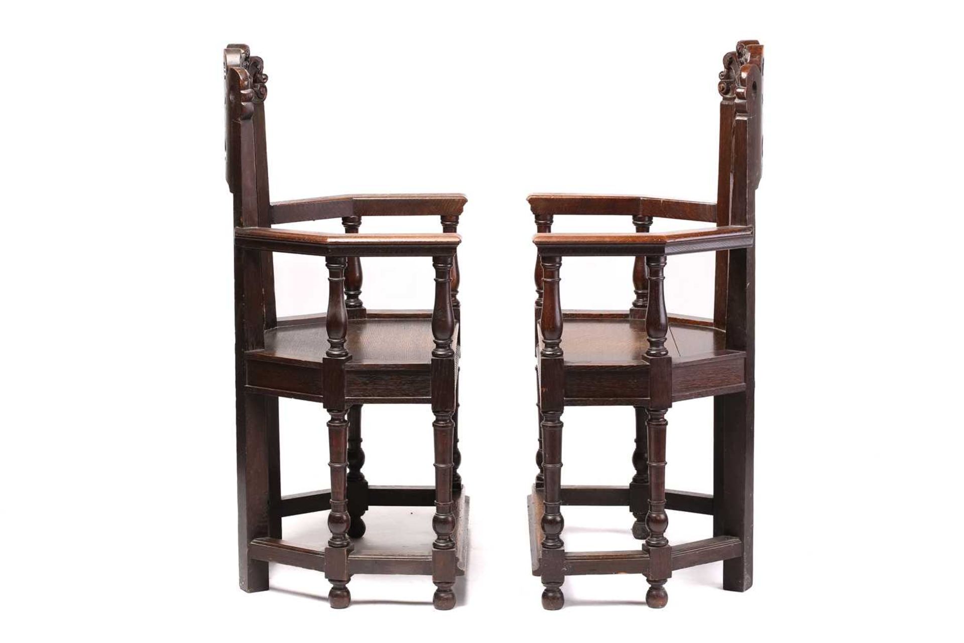 A pair of French carved oak caquetoire armchairs, 19th/20th century, the curved backs carved and - Image 10 of 11