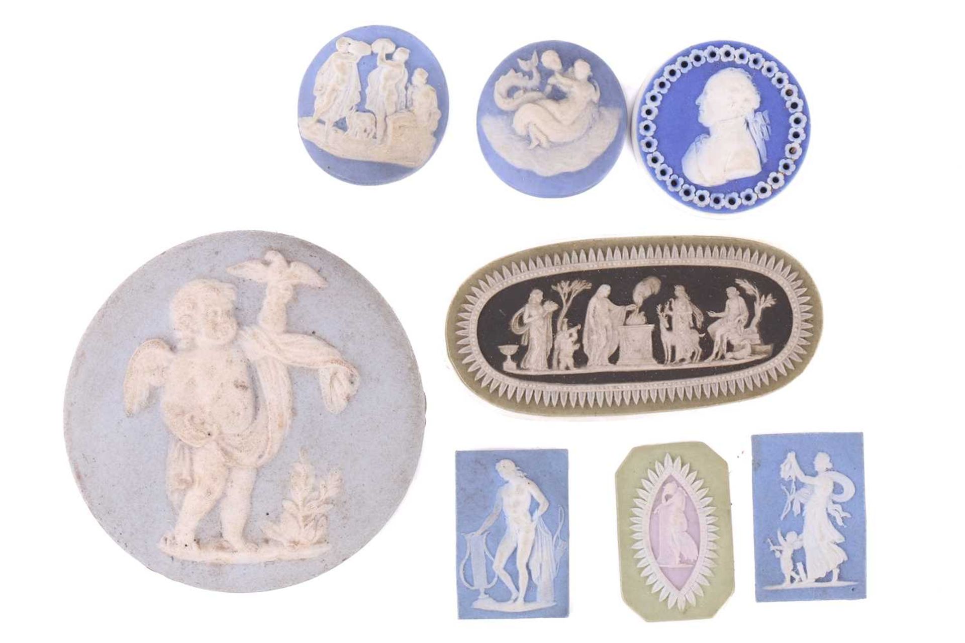 A collection of eight miniature Wedgwood jasperware tablets, mid-18th century and later, the largest