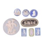 A collection of eight miniature Wedgwood jasperware tablets, mid-18th century and later, the largest
