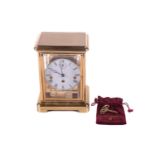 A Kieninger 8-day four glass mantel clock, model No. J0212, the enamel dial bearing Roman