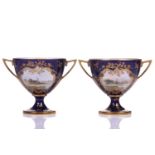 A pair of early 20th century Royal Worcester Bleu de Roi porcelain twin-handled sweetmeat urns,