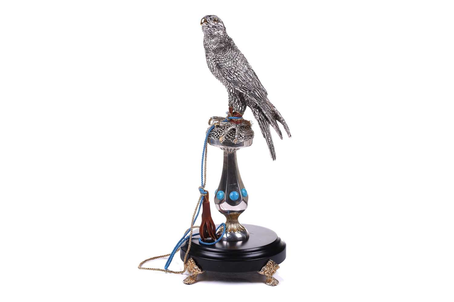 Lorenzo Sandomar, a large model of a silver and gold plated falcon, marked 925, standing on a