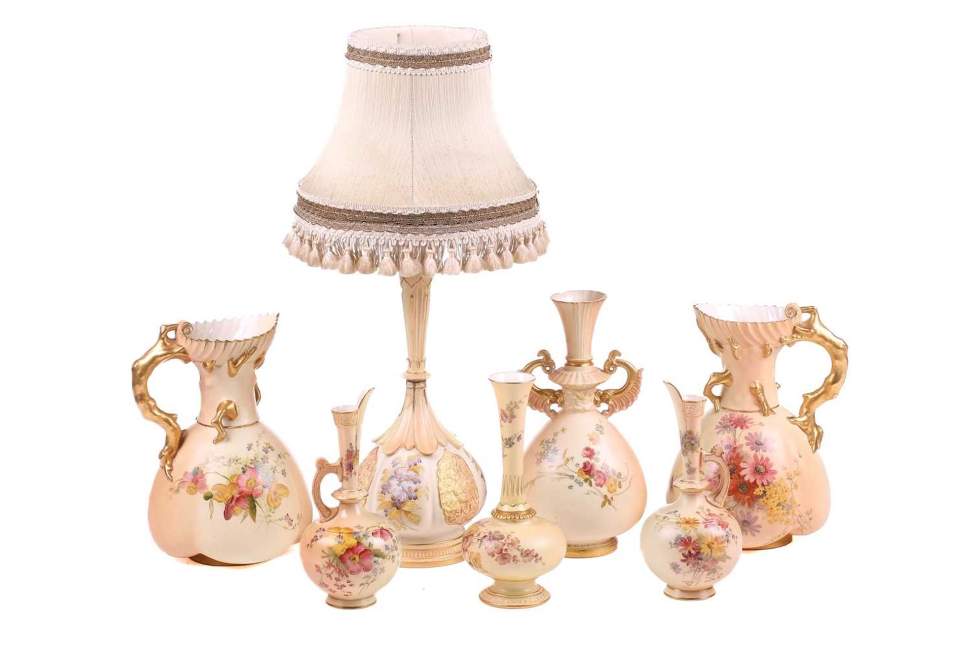 A collection of early 20th century Royal Worcester blush ivory ceramics, each with floral