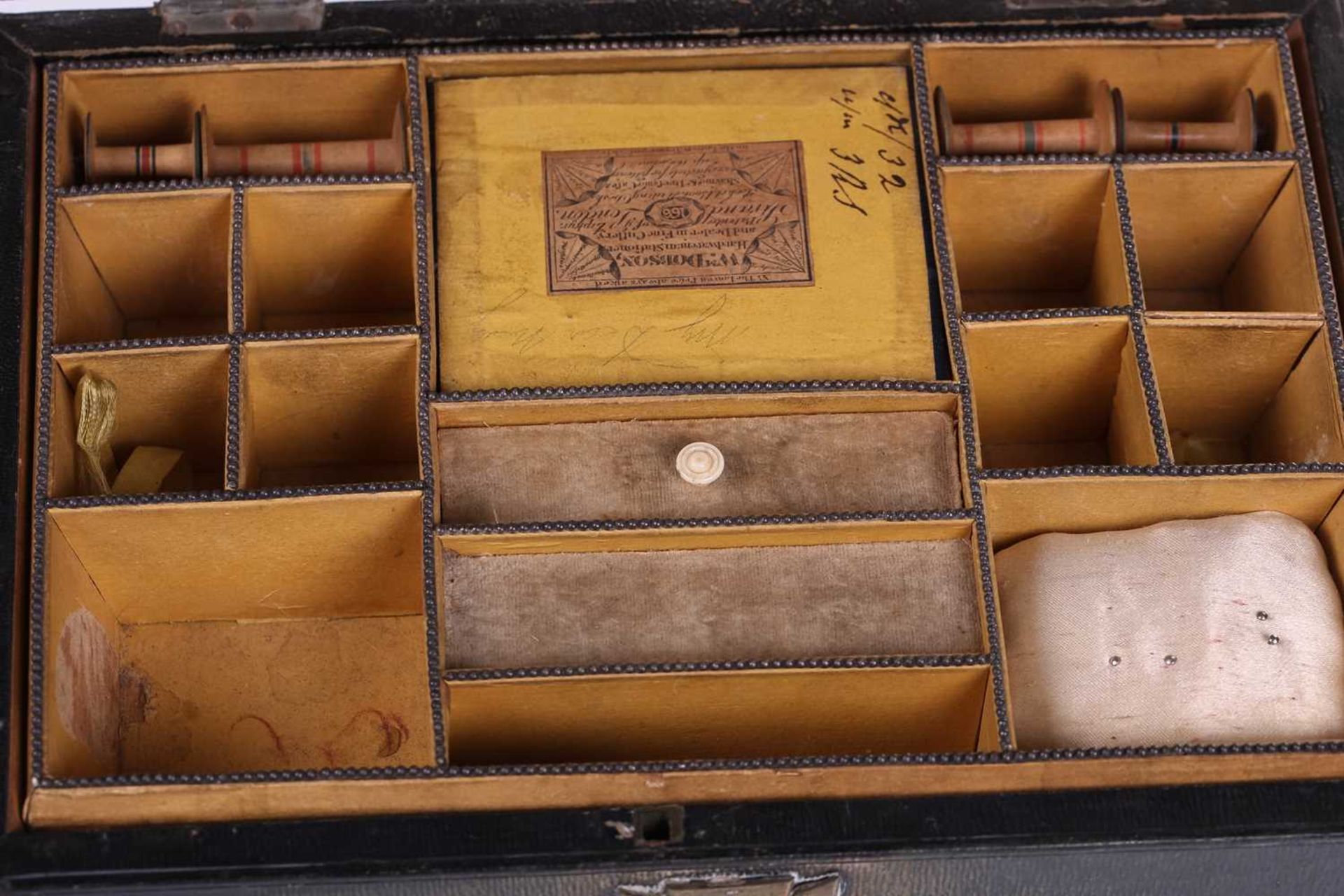 A Regency sewing box of casket form, green morocco decorated with brass appliques, on four lion - Image 14 of 19