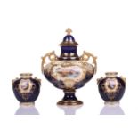 A Coalport Bleu de Roi porcelain two-handled globular urn and cover hand painted with romantic