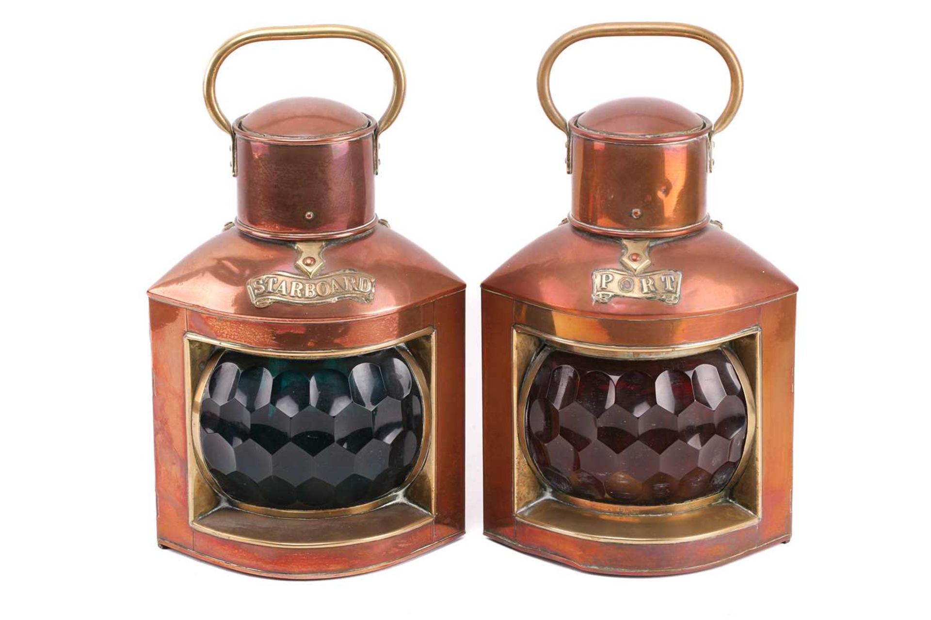 A pair of copper and brass ship's port and starboard lamps with oil burners and faceted green and