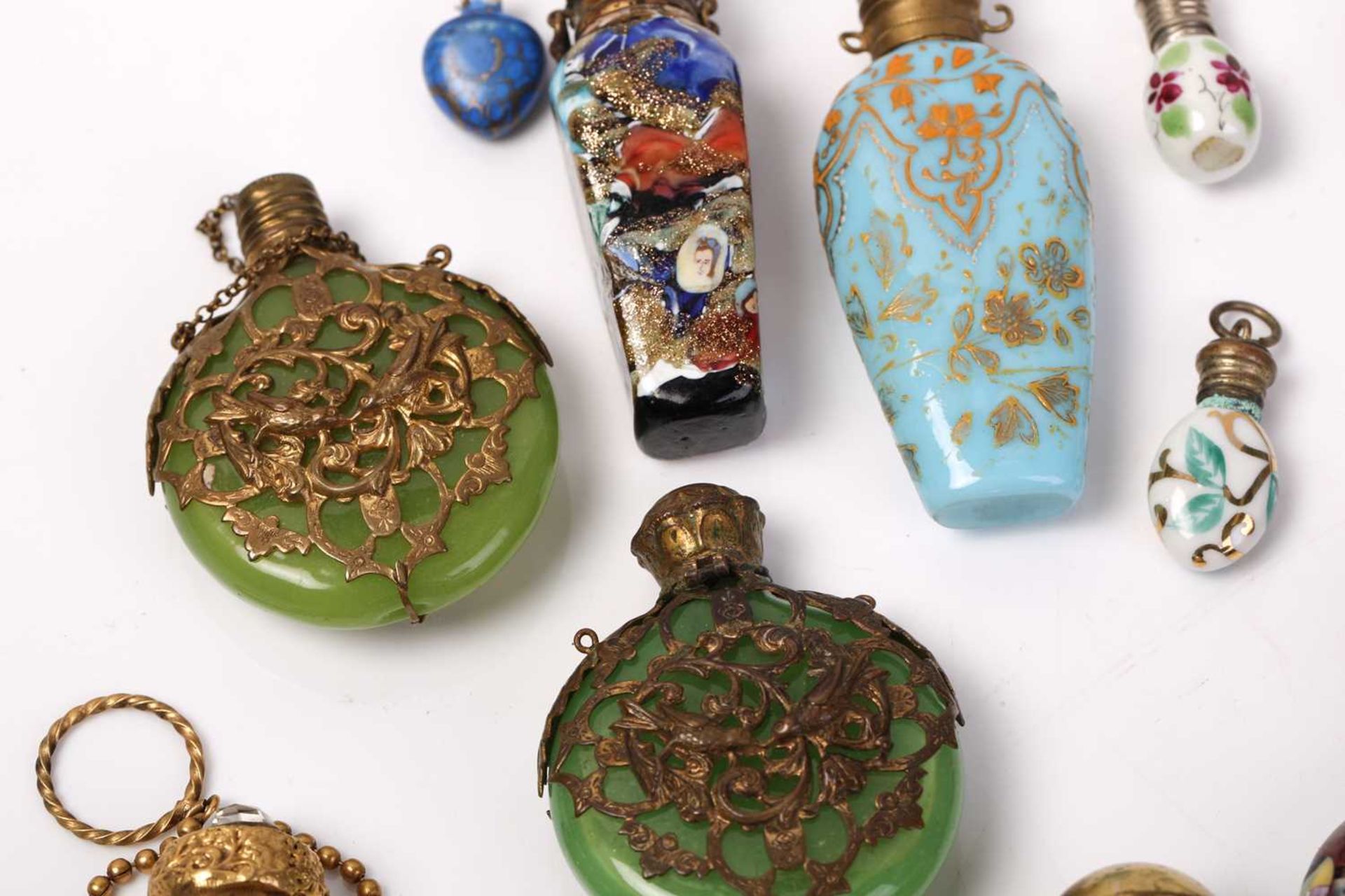 A good collection of miniature Continental ceramic and Murano glass scent bottles, many with gilt - Image 5 of 19