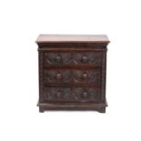 A carved oak 17th-century style three-drawer chest (17th century period timber and later, re-