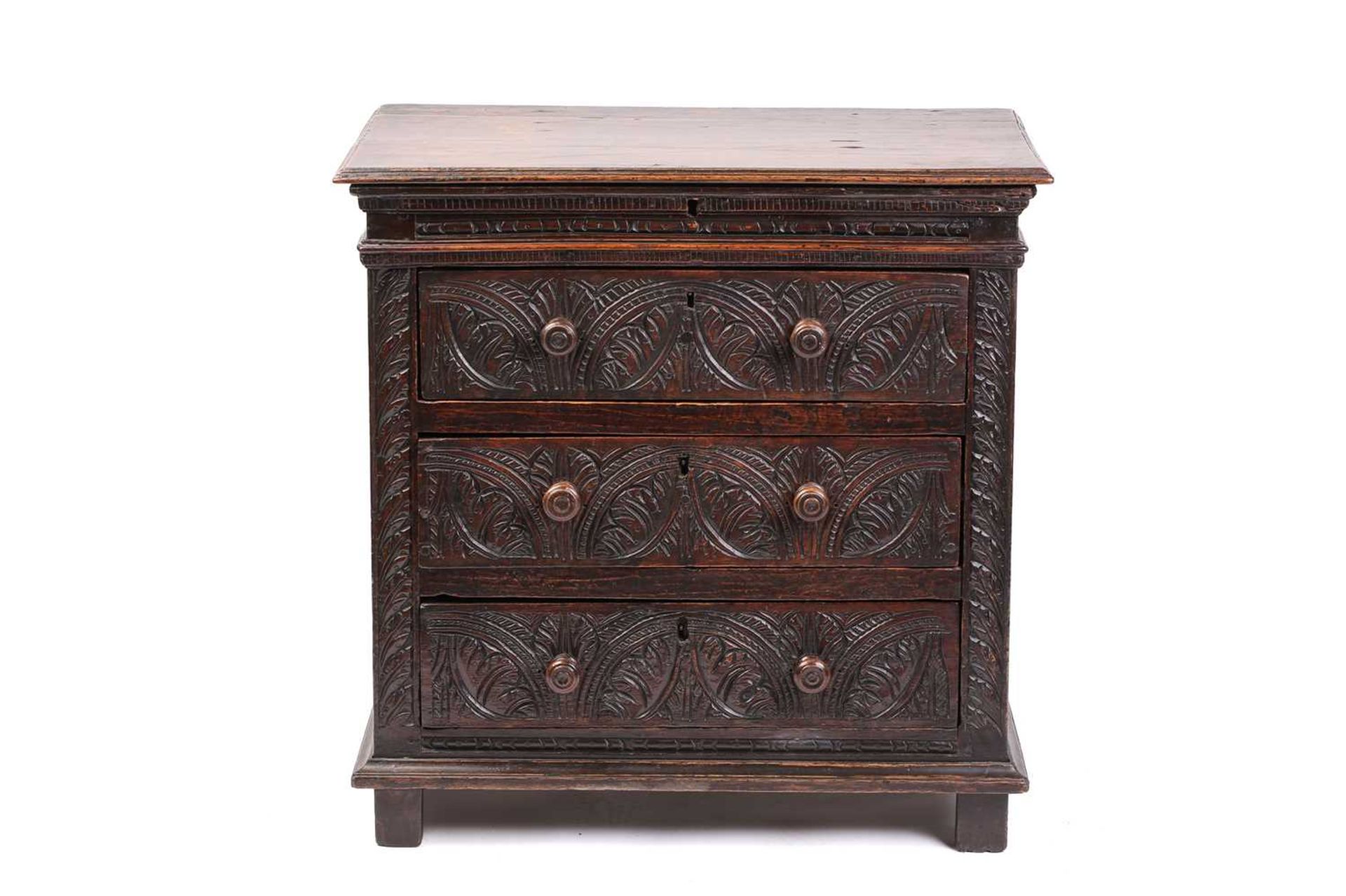 A carved oak 17th-century style three-drawer chest (17th century period timber and later, re-