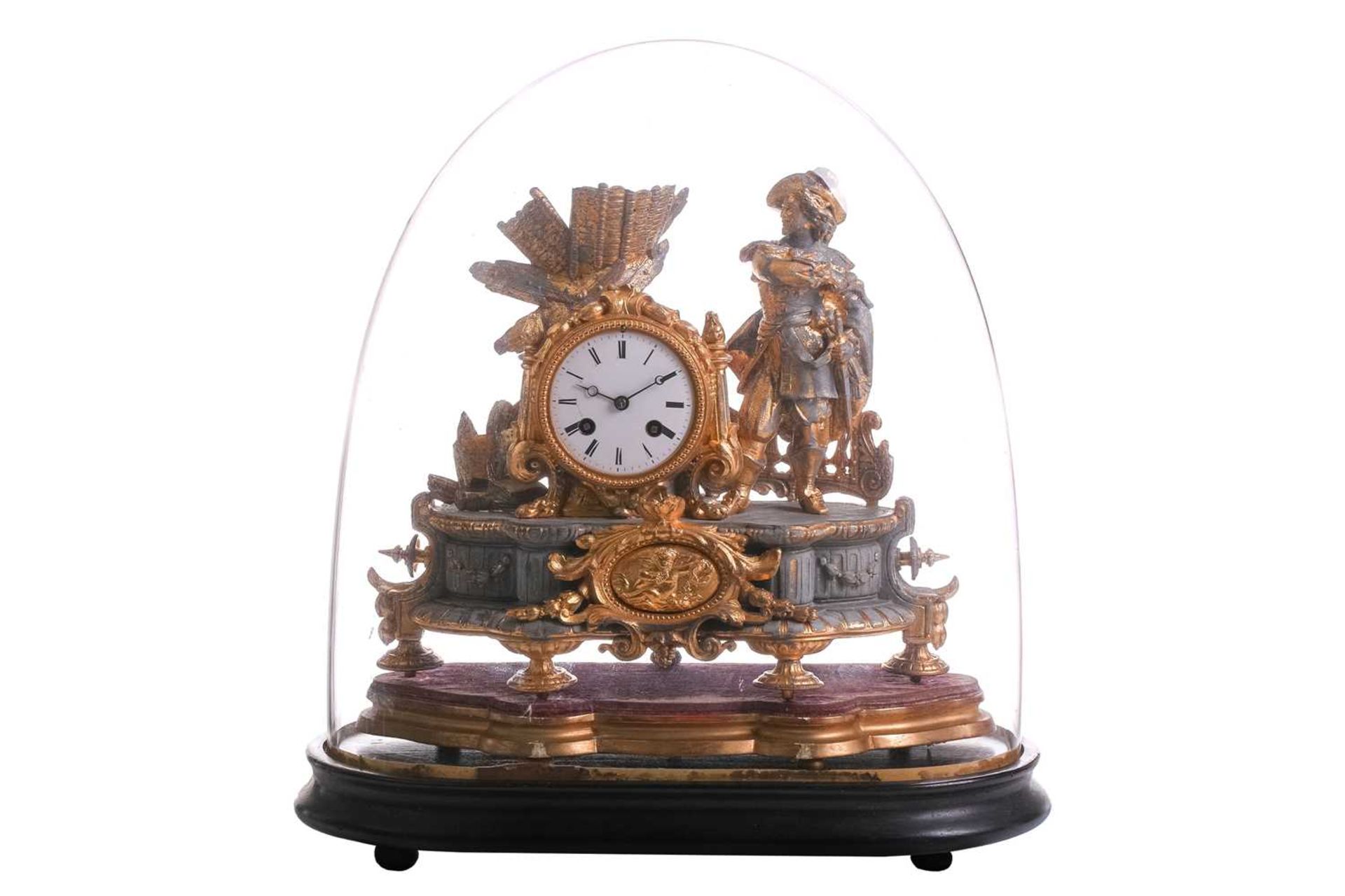 A late 19th century French parcel gilt spelter clock, depicting a nobleman standing beside a drum